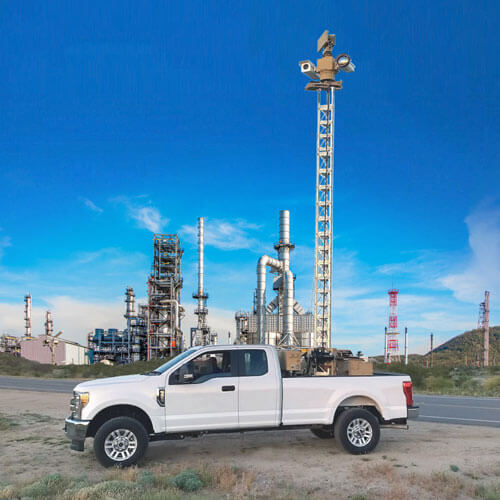 Oil and Gas plant behind truck mounted tower